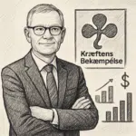 Jesper Fisker i jakkesæt foran Kræftens Bekæmpelses logo, symboliserer lønoverblik og branchelønssammenligning