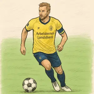 Fodboldspilleren Patrick Mortensen i kamptrøje på grøn bane illustrerer artikel om Patrick Mortensen løn 2024