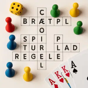 Krydsord med ord om brætspil flankeret af terninger, spillebrikker og kort