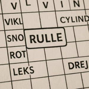 Nærbillede af krydsord med ordet “rulle” indrammet, omgivet af mulige synonymer og løsningsforslag